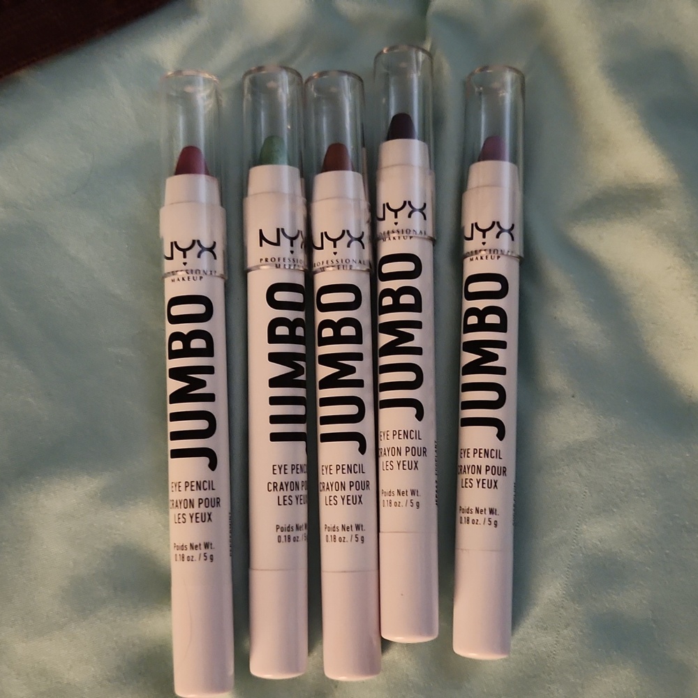 5 NYX jumbo eye shadow pencils.